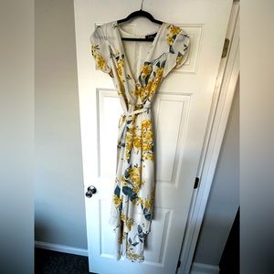Lulus NWOT size Small, high low wrap dress, floral pattern.